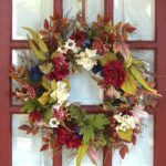 floral wreath on window of door