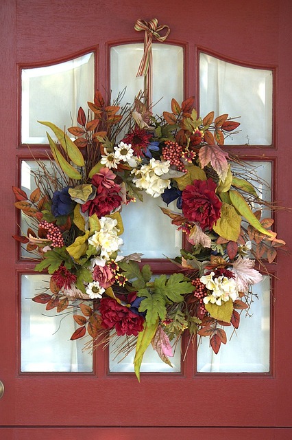 floral wreath on window of door